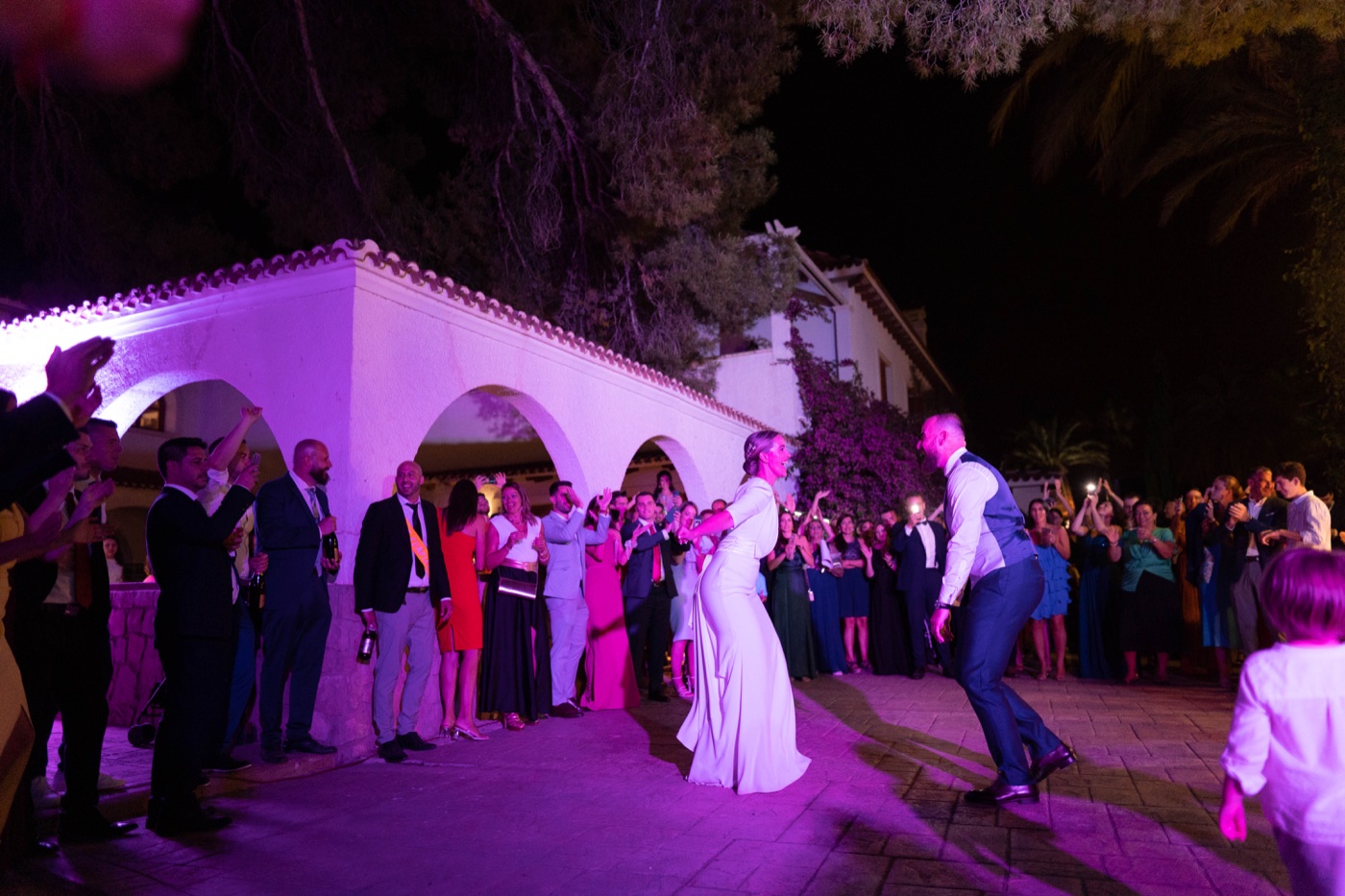 Wedding party with DJ and outdoor dance floor at Casa Imas